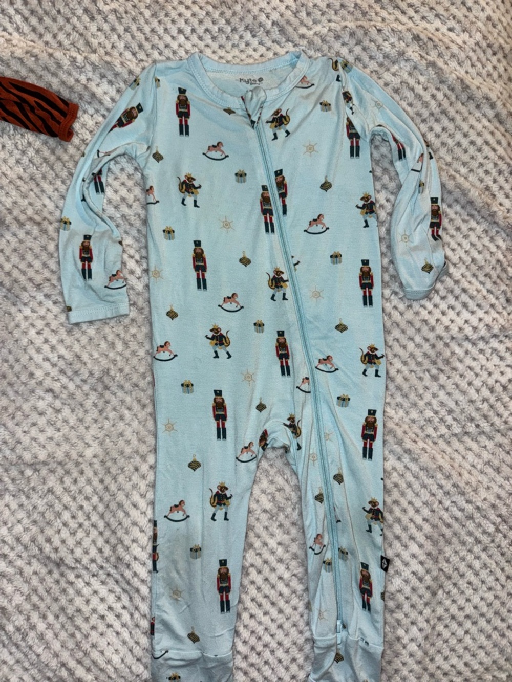 Kyte BABY Light Blue Nutcracker Print One-Piece Footie
